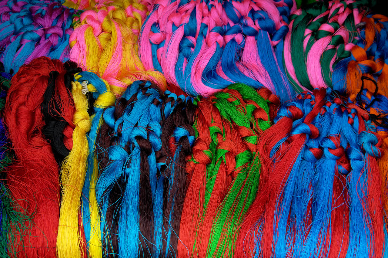 Colorful decorative strings for braiding into the hair by Tibetans, Tibet, ©2017