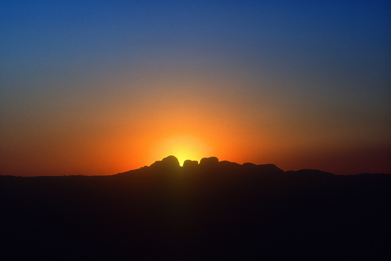 Setting sun behind the Olgas, Kata Tjuta, Uluru-Kata Tjuta National Park, NT, Australia ©2017
